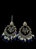 Ornate earrings with blue and white beads on a black background